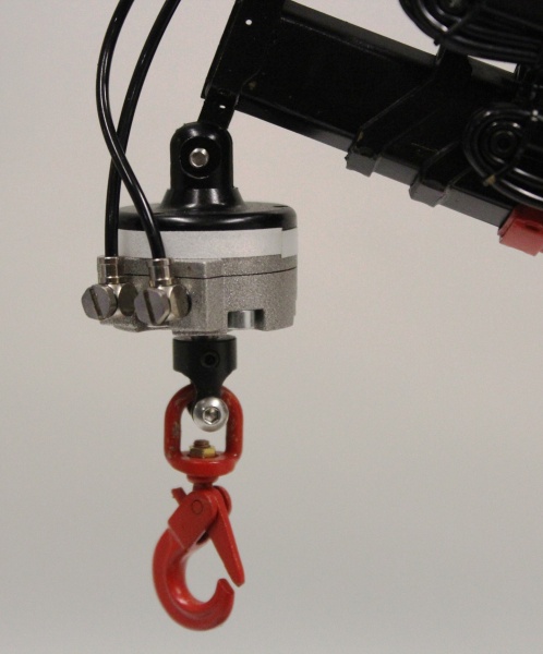 Hydraulic rotator for crane tools