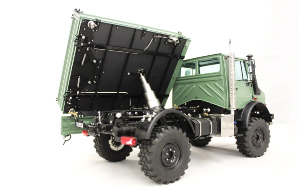 Mercedes Unimog three way tipper with front hydraulics